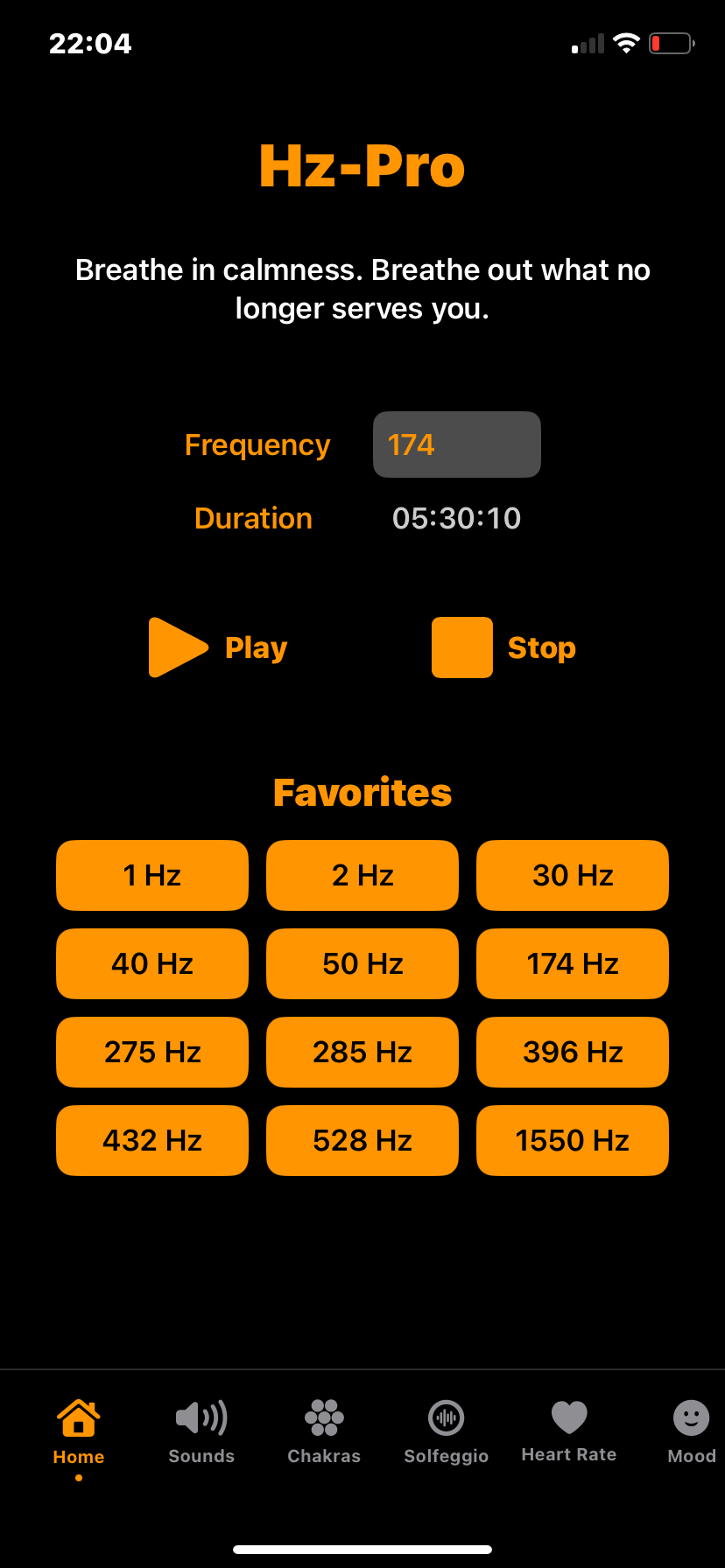 Hz-Pro main tone generator screen where users can select a frequency, set a custom session duration, and play healing tones from a list of favorite frequencies like 174 Hz, 432 Hz, and 528 Hz